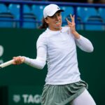 Iga Swiatek of Poland in action during the first round at the 2021 Viking International WTA 500 tennis tournament in Eastbourne