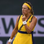 Victoria Azarenka (BLR) celebrates after winning a game against Petra Kvitova (CZE) at Indian Wells Tennis Garden.