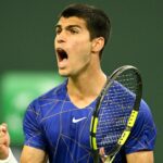 Carlos Alcaraz (ESP) celebrates after beating Cameron Norrie (GBR) at the BNP Paribas Open at the Indian Wells Tennis Garden.