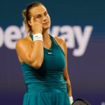 Aryna Sabalenka gestures after missing a shot during her second round women's singles match in the Miami Open at Hard Rock Stadium.