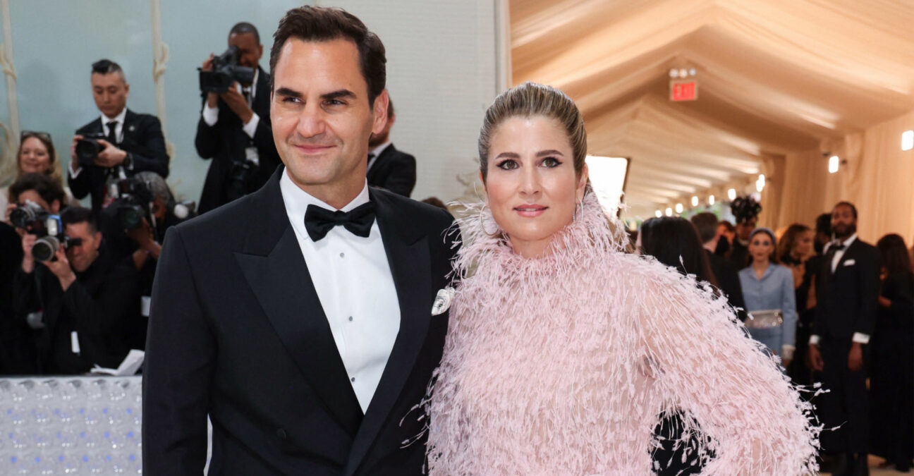 Roger Federer and his wife Mirka Federer pose at the Met Gala