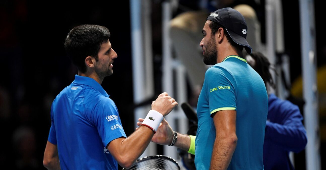 Tennis - ATP Finals - The O2, London, Britain - November 10, 2019 Serbia's Novak Djokovic shakes hands with Italy's Matteo Berrettini after winning their group stage match