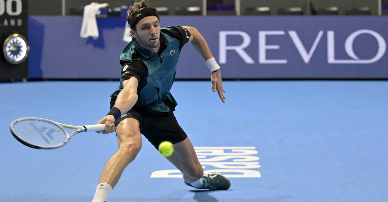 Arthur Rinderknech from France hits a slice forehand while playing against Holger Rune in semi-final in Basel in 2022