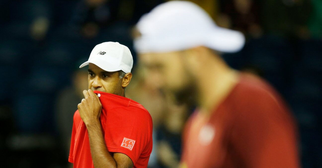 Rajeev Ram Davis Cup 2022 Jack Sock in front white cap red tee-shirt